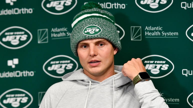 Jets quarterback Zach Wilson meets with reporters after the team's...