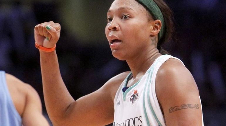 New York Liberty #23 Cappie Pondexter celebrates after scoring against...