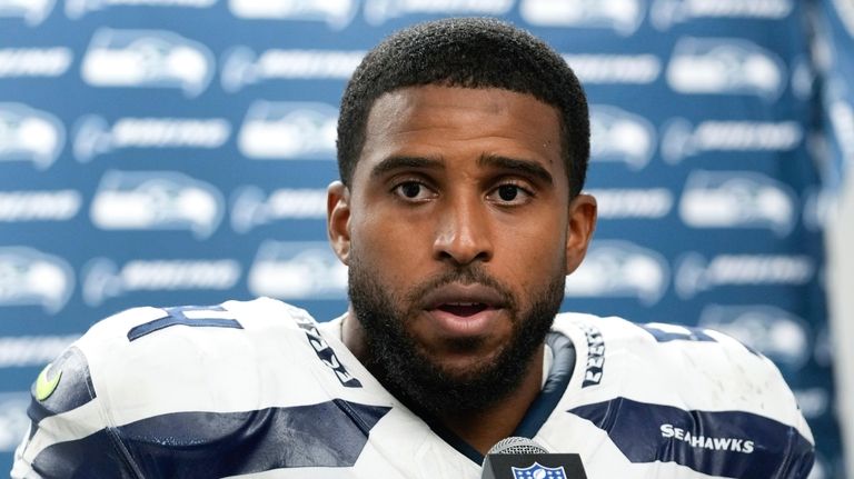 Seattle Seahawks linebacker Bobby Wagner talks after an NFL football...