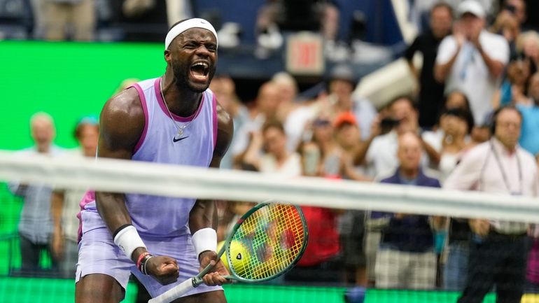 Frances Tiafoe, of the United States, reacts after defeating Ben...