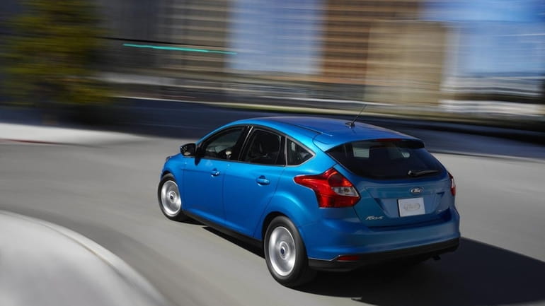 The 2013 ST starts out as a Ford Focus four-door...