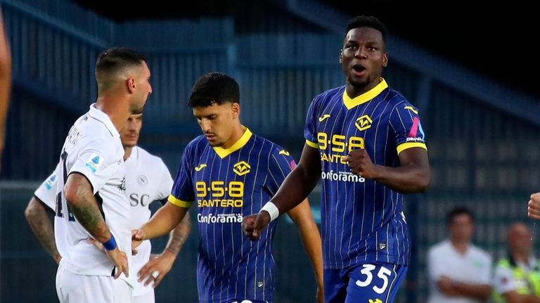 Hellas Verona's Daniel Mosquera, right, celebrates scoring during the Serie...