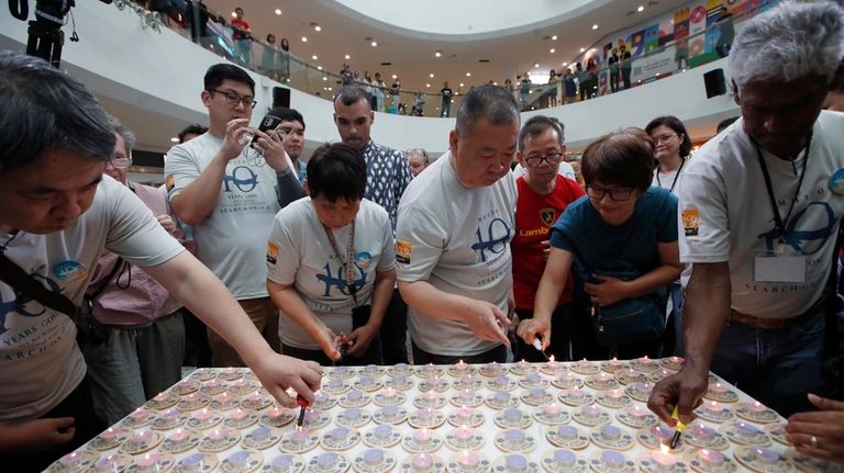 Family members and relatives of passengers on board of the...