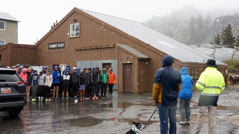 A group of cross country athletes, who had traveled from...