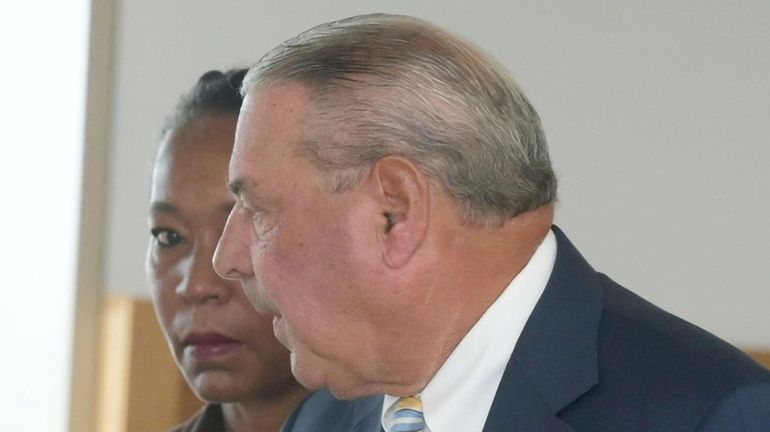 Judge Aletha Fields, left, appears in court on a charge...