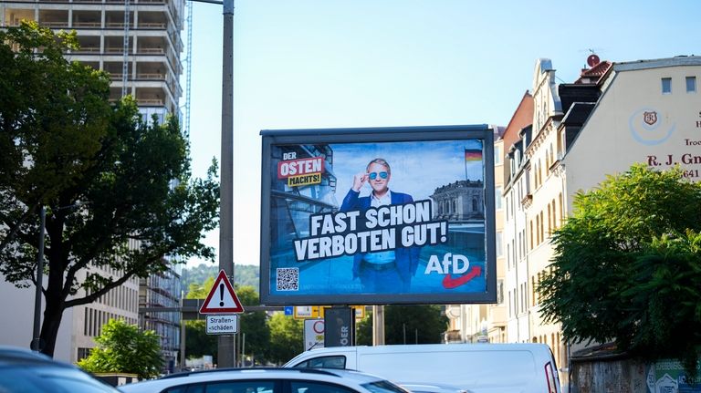 An election campaign poster of the far-right Alternative for Germany,...