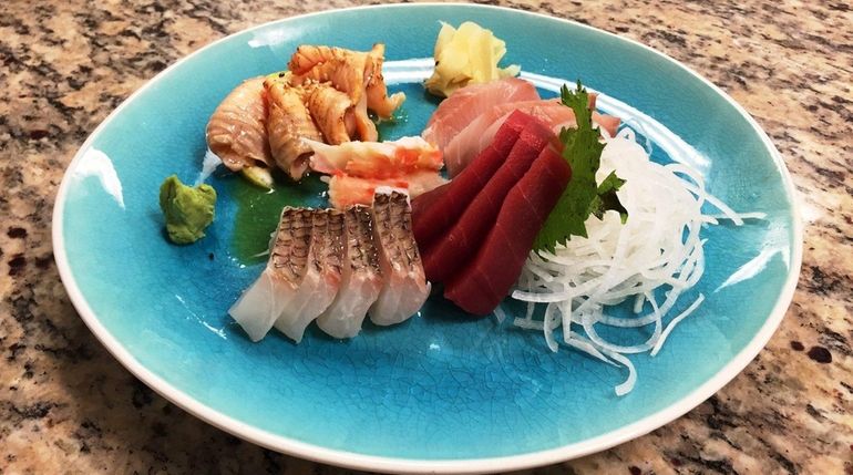 Sashimi is on the eclectic menu at King's Premium Seafood...