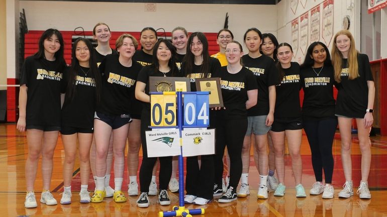 Ward Melville wposes after winning the Suffolk girls badminton team championship against...