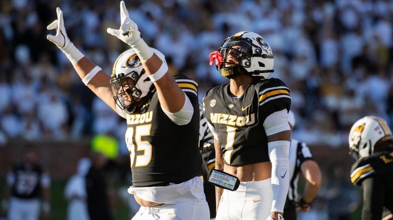 Missouri safety Marvin Burks Jr. (1) celebrates after his interception...