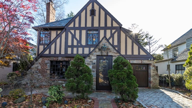 Priced at $949,000 in Rockville Centre, this 5,200-square-foot Tudor has three...