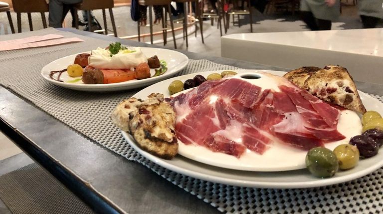 Iberico ham and burrata are specialties from the "M Bar" at...