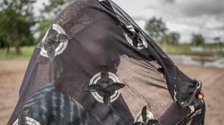 Fatoumatta, a survivor of female genital mutilation, poses for a...