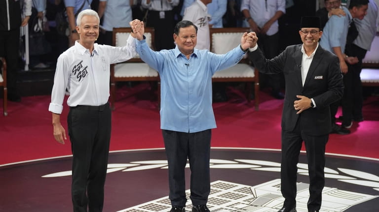 Indonesia's Presidential candidates, from left, Ganjar Pranowo, Prabowo Subianto and...