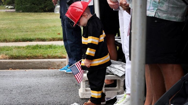 Liam Robert Collins, 3, the great-grandson of FDNY Firefighter Bob...