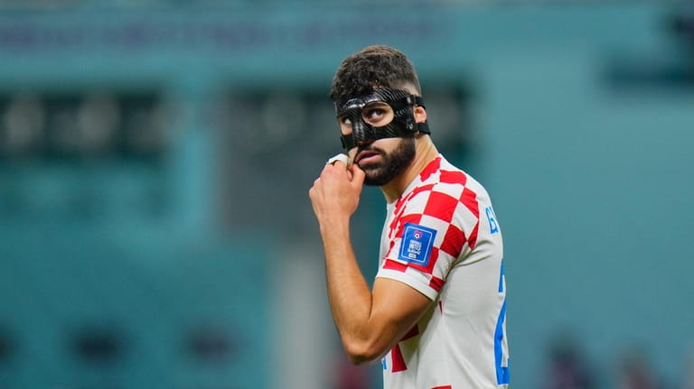 Croatia's Josko Gvardiol looks on during the World Cup third-place...