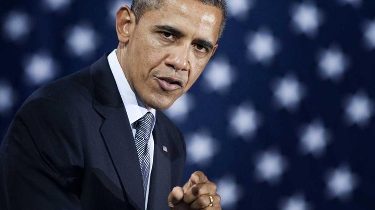 US President Barack Obama speaks during a campaign event at...