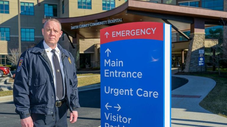 Marion Police Chief John Clair poses outside the Emergency Room...