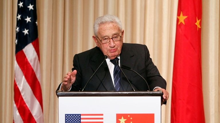 FILE- Former Secretary of State Henry Kissinger addresses a dinner,...