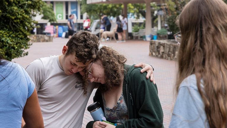 University of North Carolina-Chapel Hill first-year students Lucas Moore, left,...