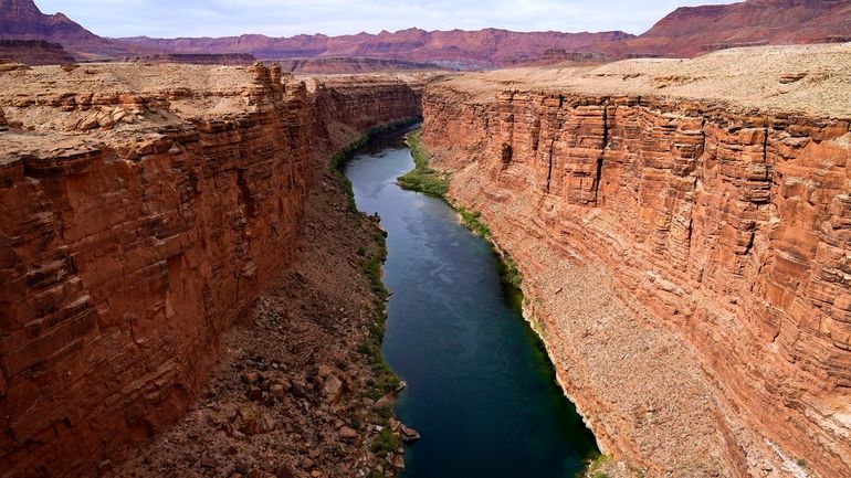 The Colorado River in the upper River Basin is seen,...