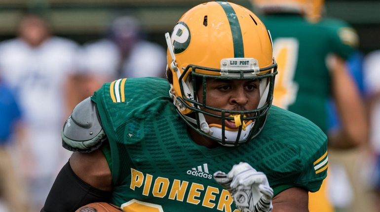 LIU Post Pioneers running back Jonathan DeBique on way to...