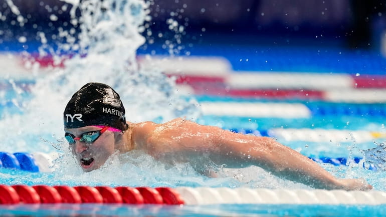 Zach Harting swims during a Men's 200 butterfly semifinals heat...