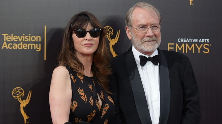 FILE -Wendy Haas, left, and Martin Mull arrive at night...