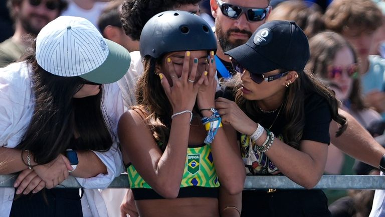 Rayssa Leal, of Brazil, rreacts after a poor second run...