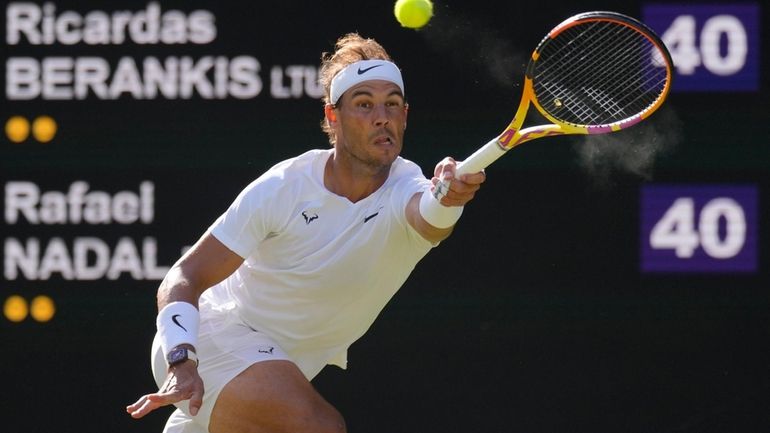 Spain's Rafael Nadal returns to Lithuania's Ricardas Berankis in a...