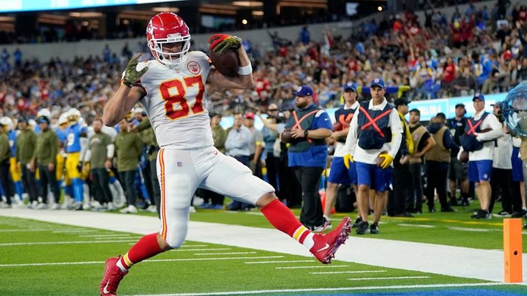 Kansas City Chiefs tight end Travis Kelce runs in for...