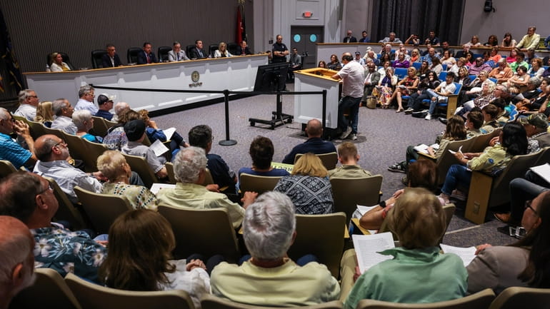 Huntington residents debate allowing basements and garages as accessory dwelling...