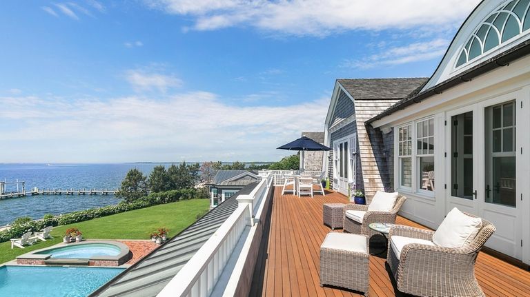 A 2,800-square-foot deck overlooks Moriches Bay.