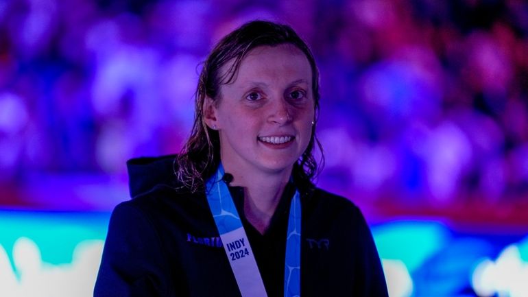 Katie Ledecky smiles after the Women's 800 freestyle finals Saturday,...