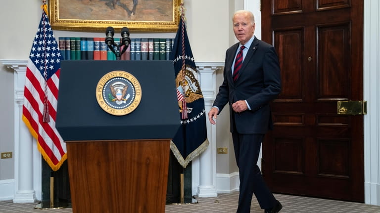 President Joe Biden arrives to deliver remarks on student loan...