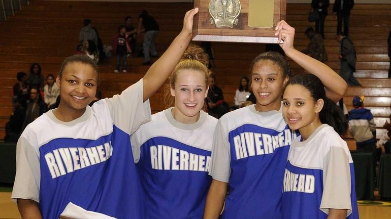 Riverhead captains, from left, Shanice Allen, Marta Czaplak, Melodee Riley...