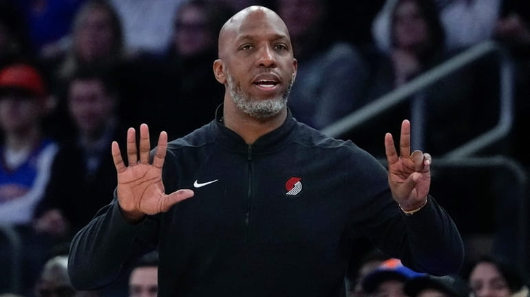 Trail Blazers coach Chauncy Billups gestures players during the first...