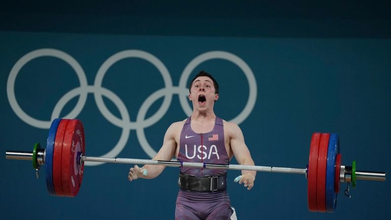 Hampton Morris of the United States reacts as he competes...