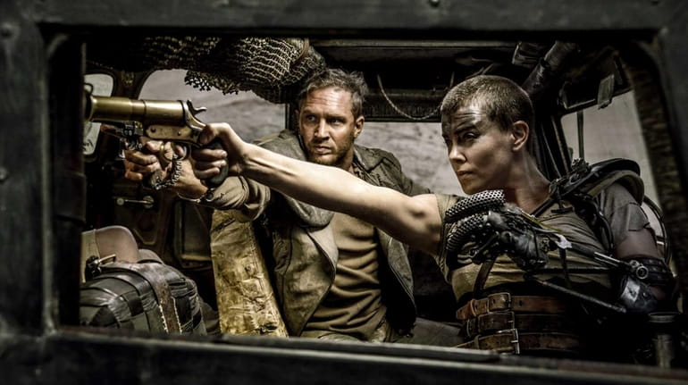 Tom Hardy and Charlize Theron in Warner Bros. Pictures' "Mad...