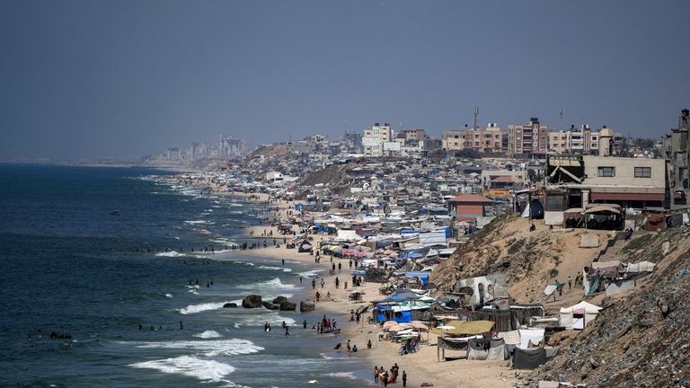 Tents are crammed together as displaced Palestinians camp on the...