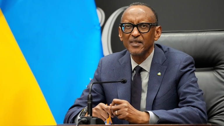Rwanda's President Paul Kagame gives a press conference at Kigali...