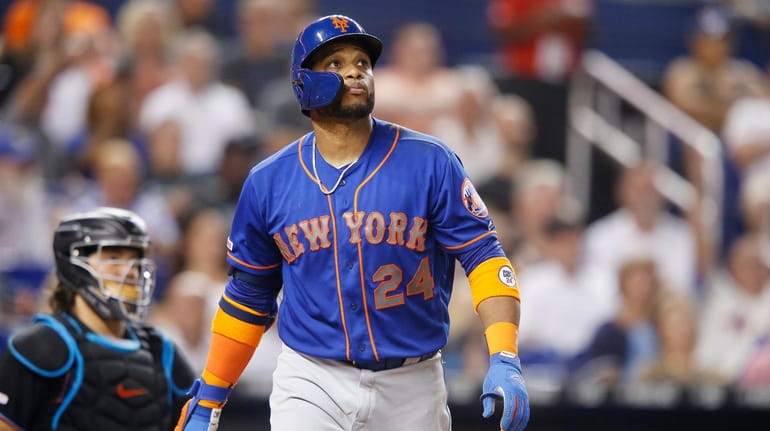 Robinson Cano of the New York Mets watches his two-run...