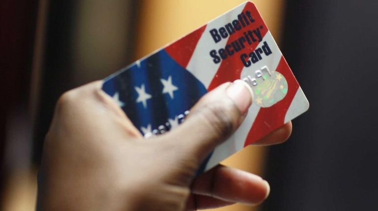 A Federal food stamps card that is used to purchase...