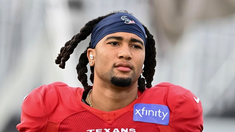 Houston Texans quarterback C.J. Stroud looks on during an NFL...