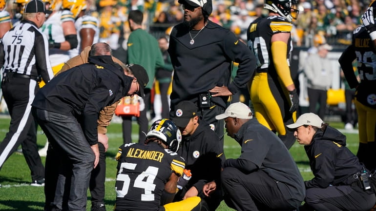 Pittsburgh Steelers linebacker Kwon Alexander (54) is examined by team...