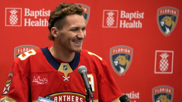 Florida Panthers forward Matthew Tkachuk speaks during NHL hockey media...