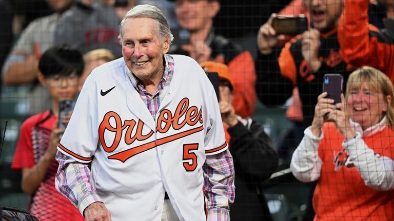 Former Baltimore Orioles third baseman Brooks Robinson is honored during...