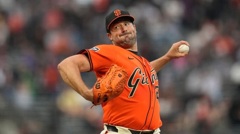 San Francisco Giants pitcher Robbie Ray works against the Detroit...