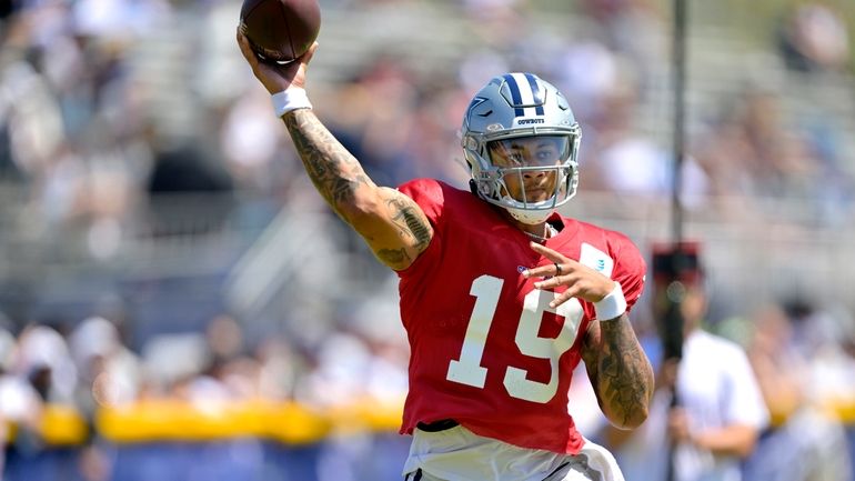 Dallas Cowboys quarterback Trey Lance participates in drills during NFL...