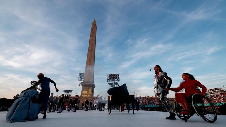 Artists perform during the Opening Ceremony for the 2024 Paralympics,...