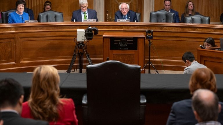 Sen. Bernie Sanders, I-Vt., top center, along with fellow Senators...